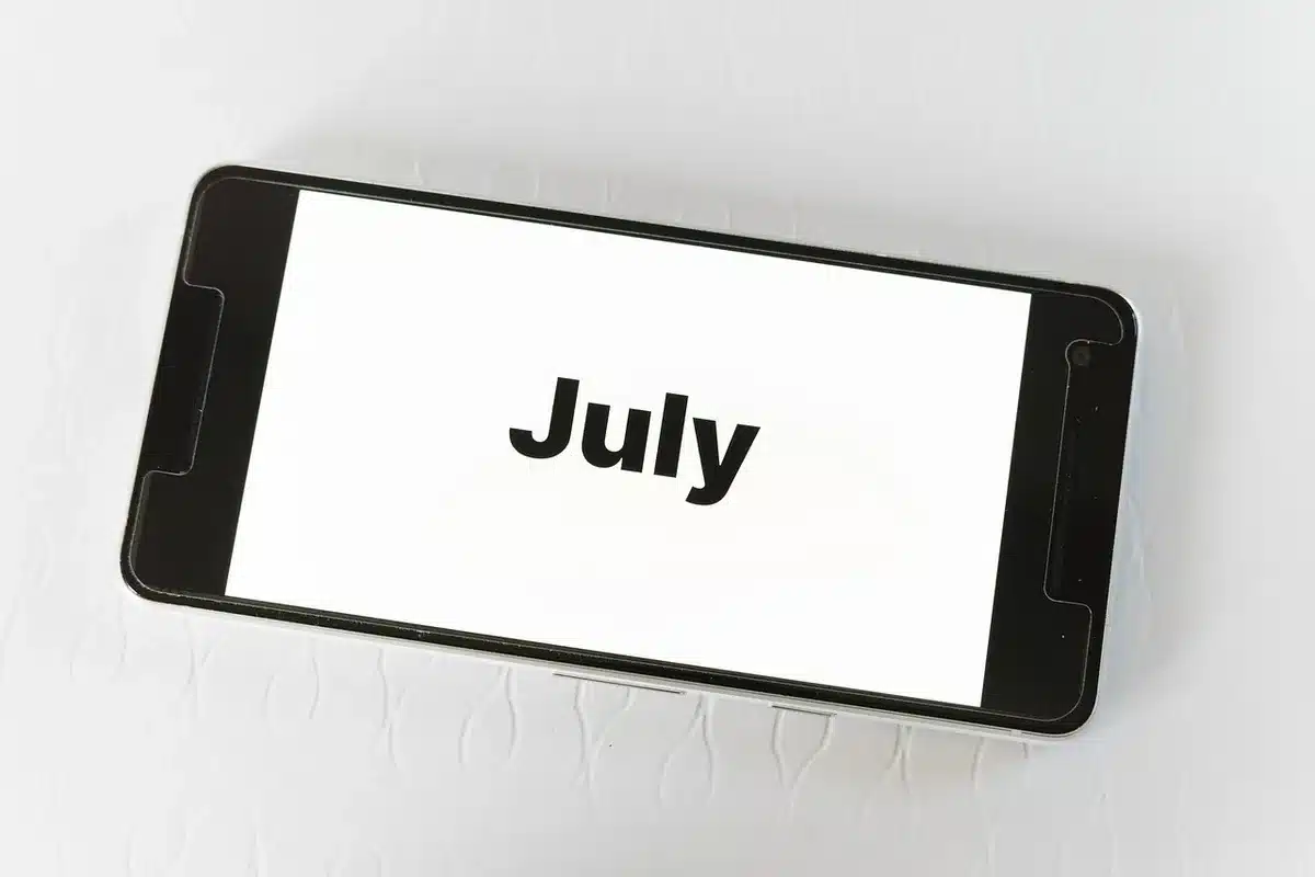 A calendar page showing October 14 circled in red, with a Social Security card nearby, symbolizing the announcement date