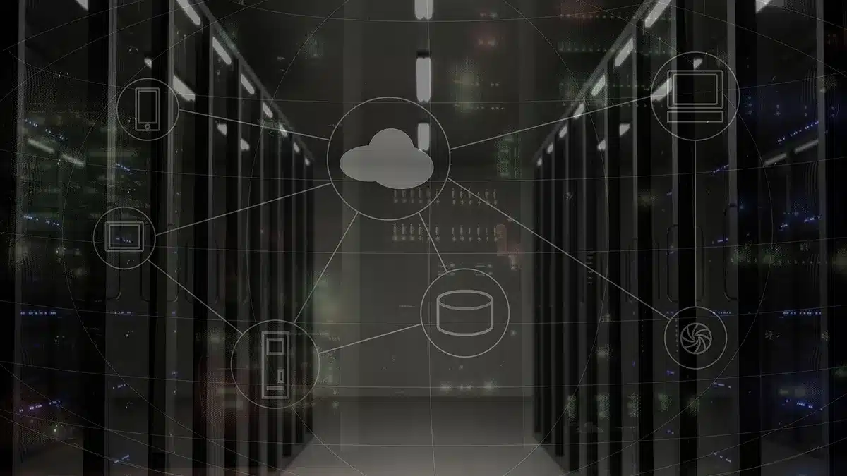 Close-up of an unbranded server rack and blurred cloud infrastructure equipment, conveying the cloud and AI infrastructure theme investors are watching